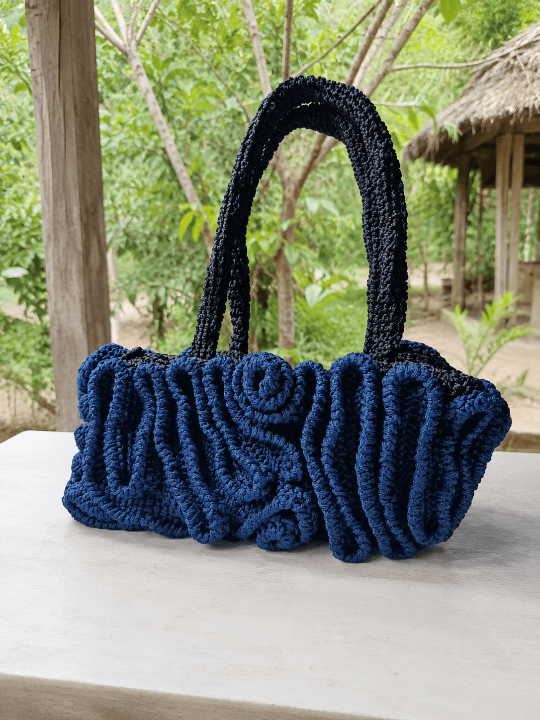 Élan Wave handmade luxury crochet handbag.