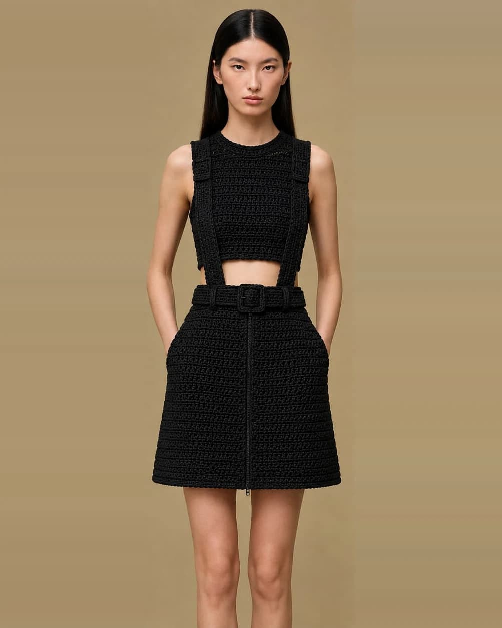 Élan Noir black crochet suspender set with signature belt and functional pockets.